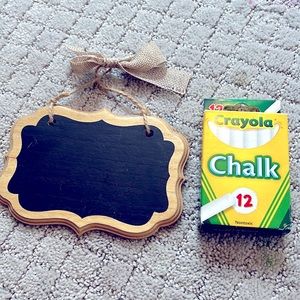 Chalkboard sign with box of chalk